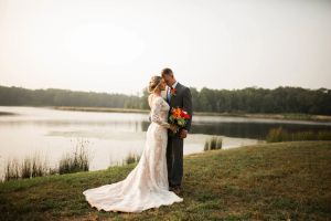 Romantic bride and groom portrait by lake in Parker County - the kind of timeless moment Jordan Blalock Photography captures beautifully
